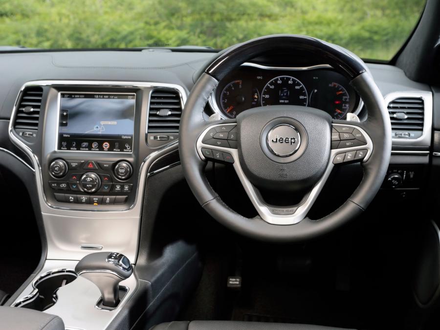  Jeep Grand Cherokee Summit 2013 года  (UK) (фото 15 из 16)